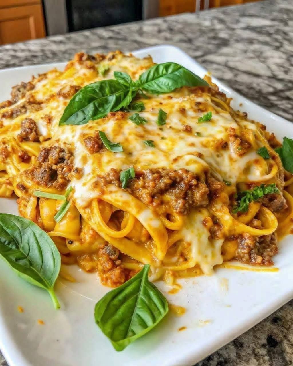 Garlic beef linguine with ground beef in a creamy Parmesan and mozzarella cheese sauce