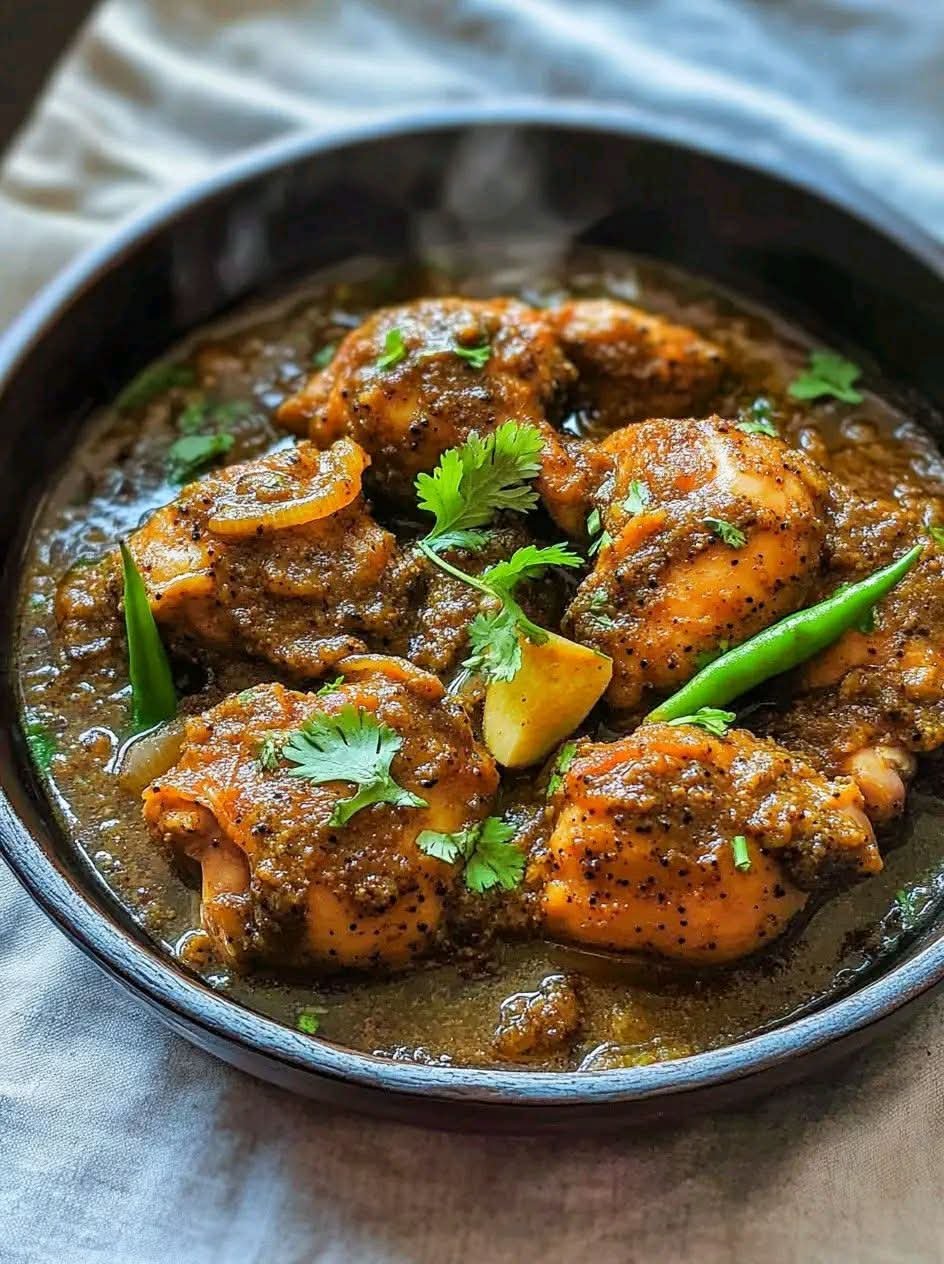 Black Pepper Chicken in rich Pakistani yogurt gravy with cilantro and green chilies