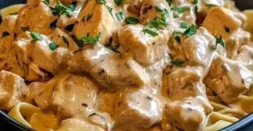 Creamy chicken stroganoff with mushrooms and egg noodles in a rich sour cream sauce