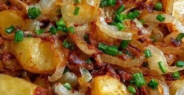 Crispy roasted potatoes with caramelized onions and green onions