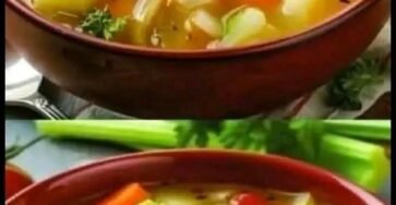 Homemade vegetable soup with potatoes, carrots, cabbage, celery, and bell peppers