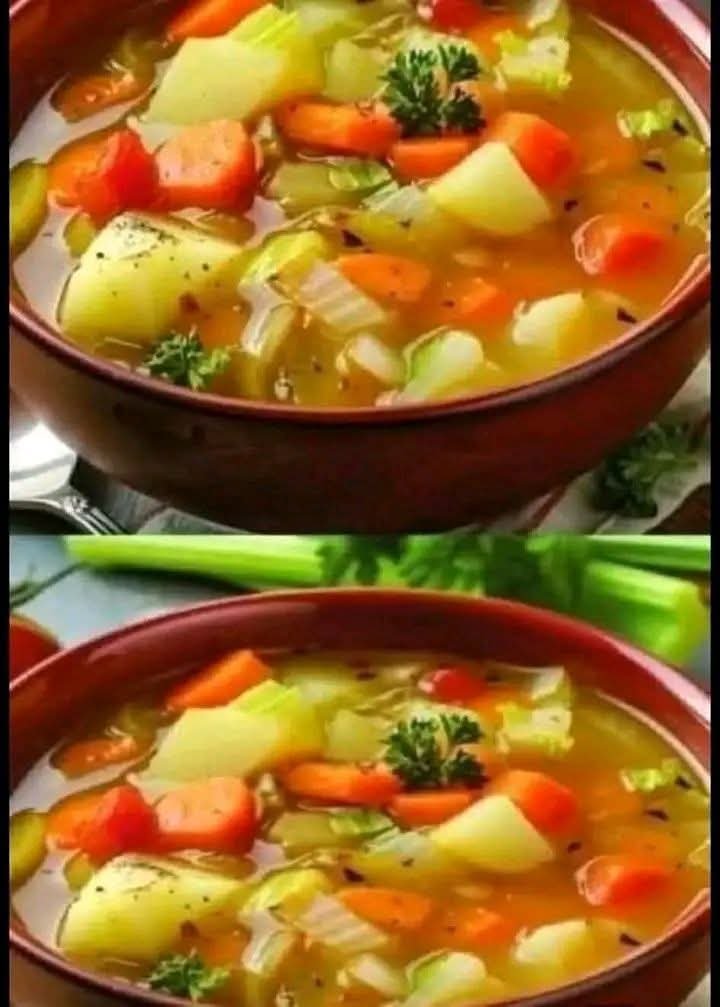 Homemade vegetable soup with potatoes, carrots, cabbage, celery, and bell peppers