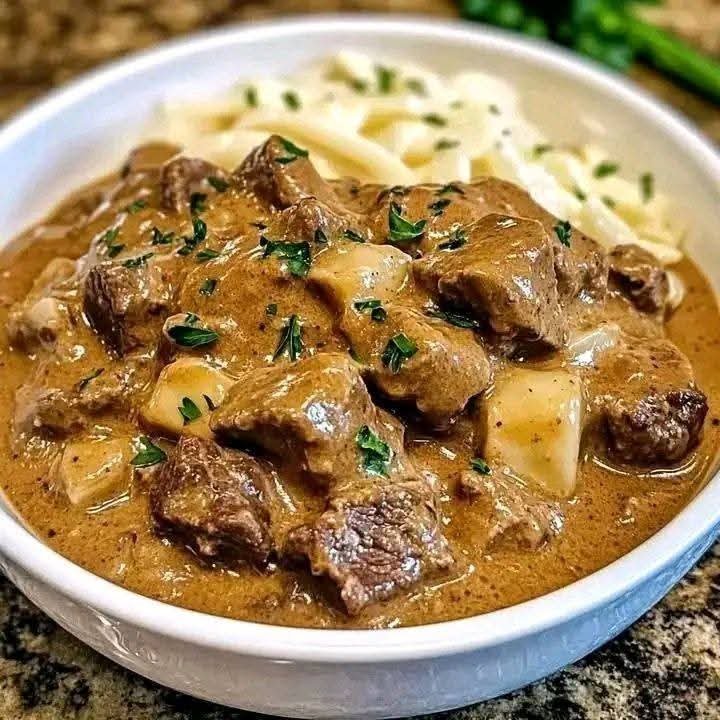 Old-Fashioned Beef Stroganoff with creamy sauce and tender beef