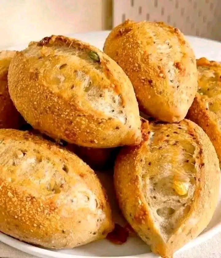 Crispy homemade seed rolls with a golden crust and soft fluffy center